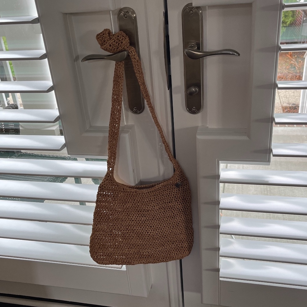 Helen Kaminski Designer Knotted strap straw/rafia purse